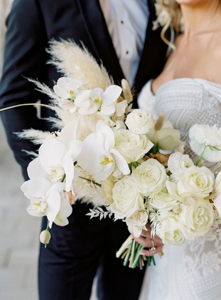 White bouquet with pampas grass and orchid