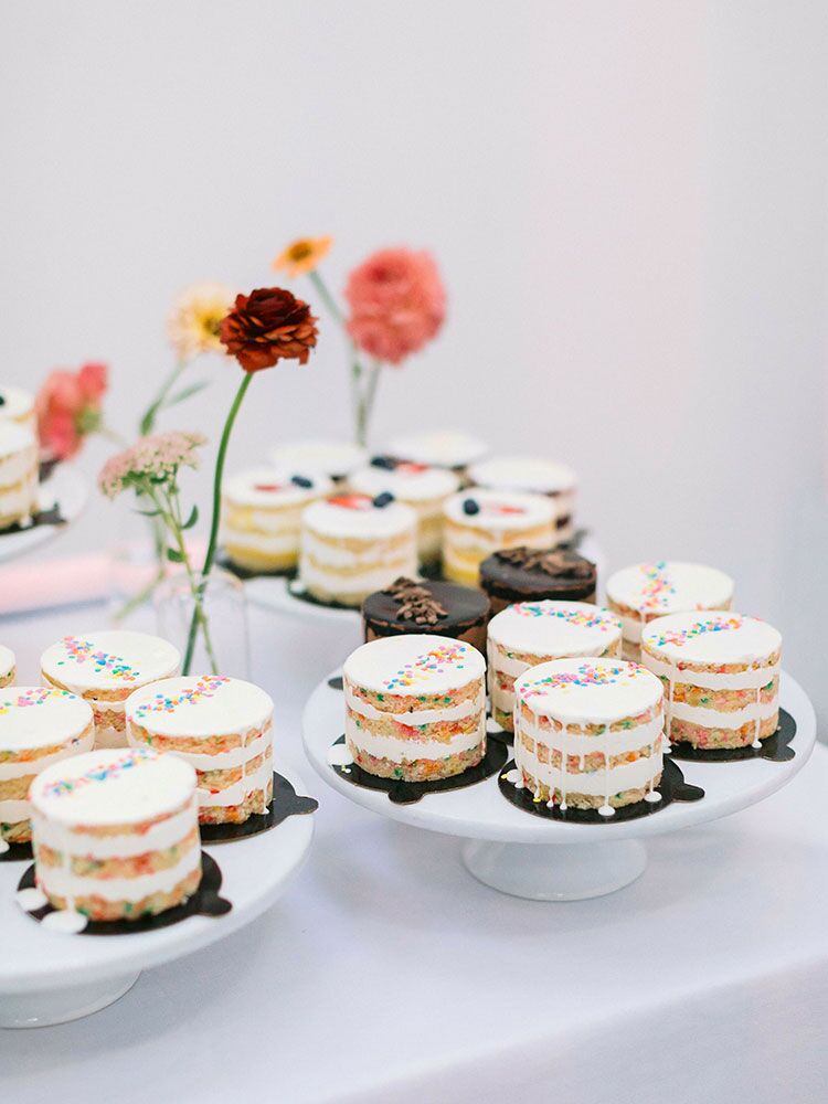 mini naked cakes at wedding dessert buffet