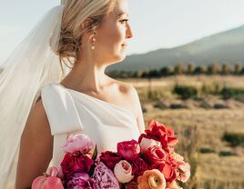 bride wearing one shoulder wedding dress