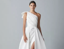 Satin draped one shoulder column gown with front slit