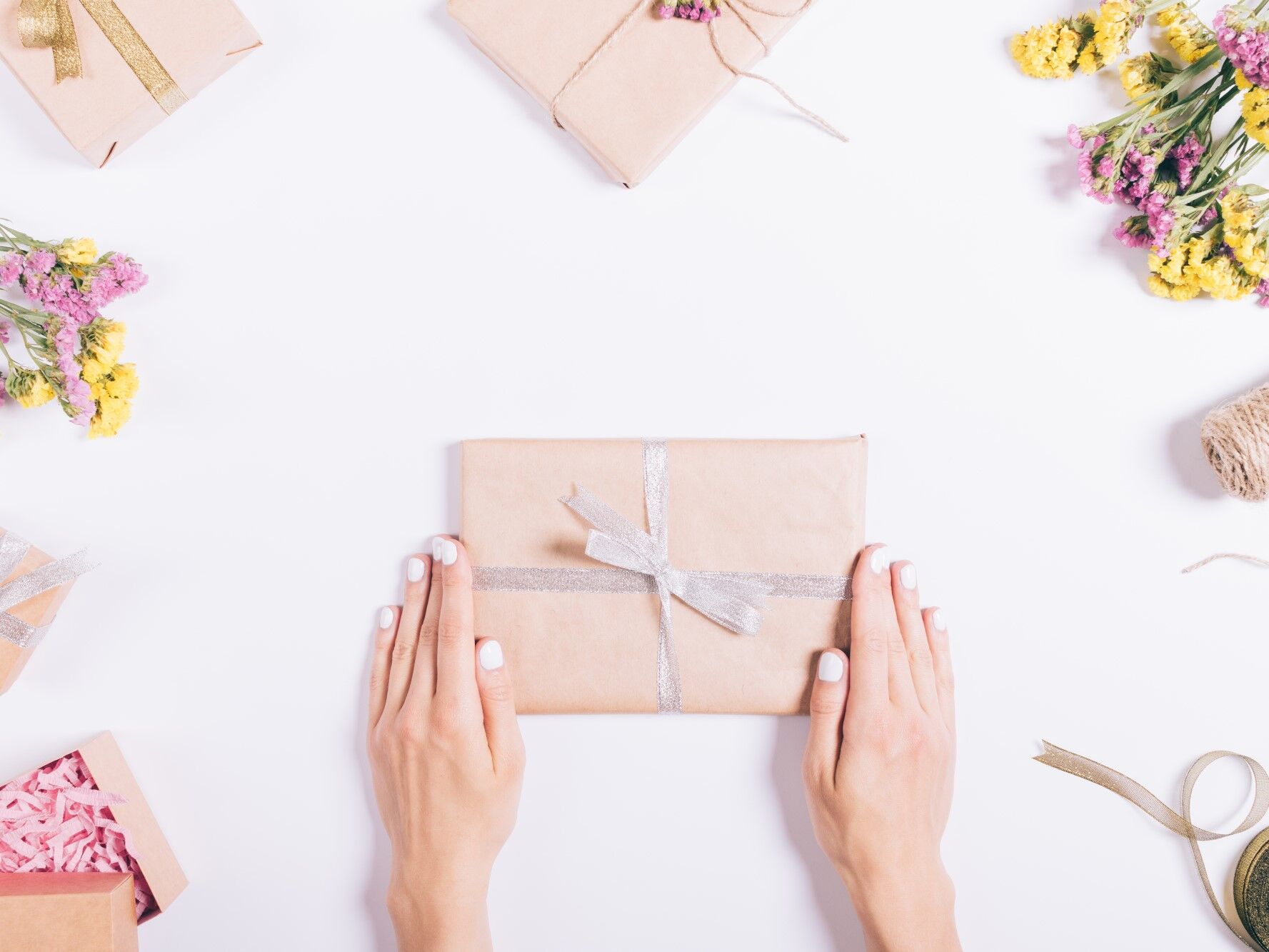 wrapped gift with grey ribbon