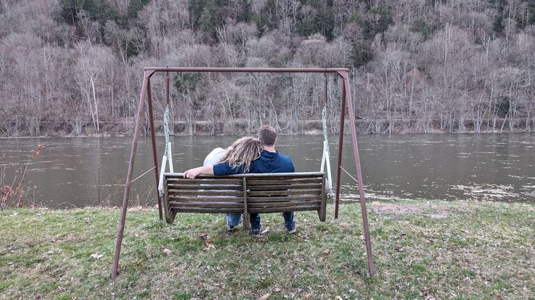 At the Cottage. This swing is where he asked me to be his wife. 