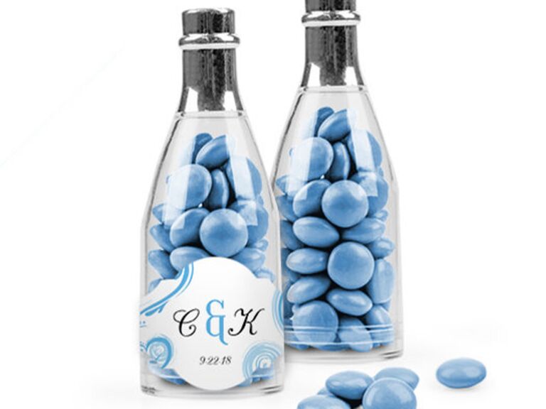 Blue milk chocolate candies in champagne bottles with custom monogram label