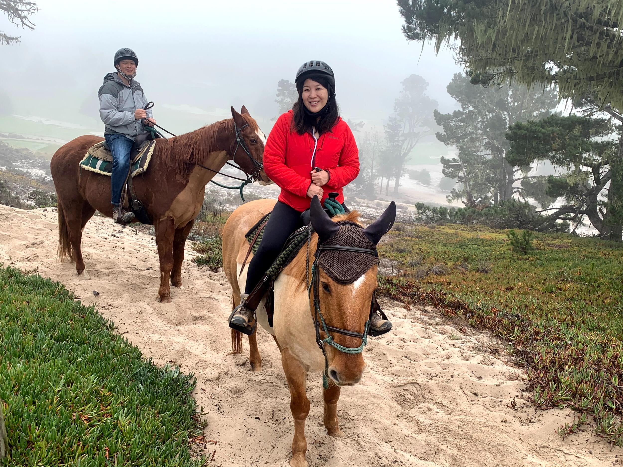 Aaron surprised Cathy with a trip to Carmel as a welcome escape from their condo. After a beachside horseback ride and scenic 17 Mile drive, Aaron proposed to Cathy in their suite at the Tickle Pink Inn overlooking the headlands.