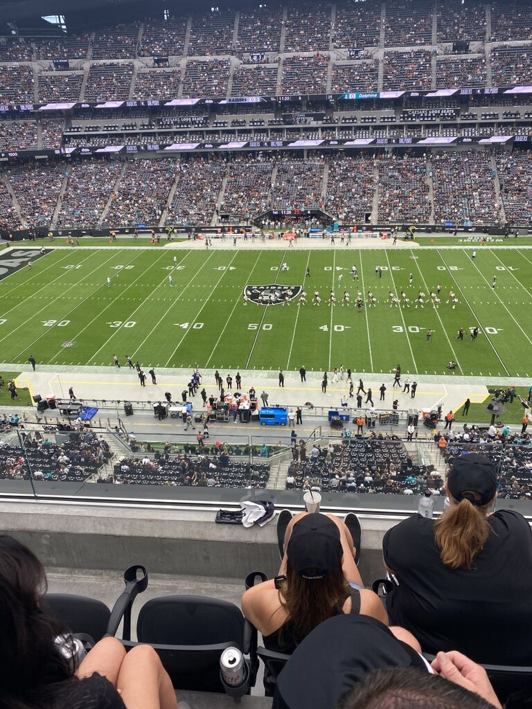 The picture that started it all... my view from the Raiders vs. Dolphins game at Allegiant stadium, with a message that read "I hope your Raiders lose". Apparently I was speaking Rob's love language. 

Sadly the Raiders won that game...