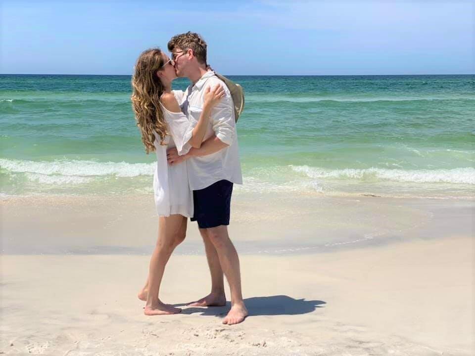 Alex and Kara on family photo day while on vacation to gorgeous Santa Rosa, FL.