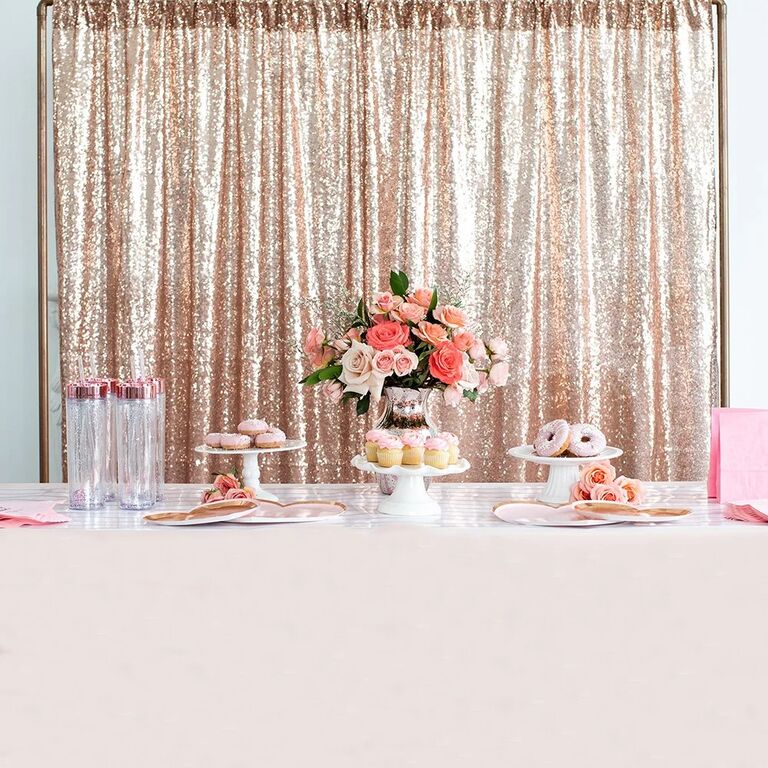 Rose gold sequin glittery engagement party backdrop