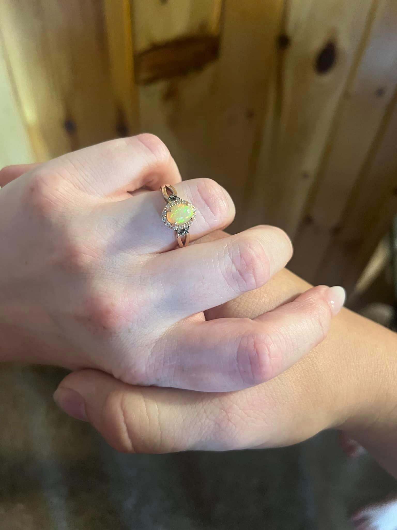 My beautiful rose gold opal/diamond ring. I couldn't have asked for anything more perfect. I've never wanted an actual diamond ring. I've always been more of a gemstone person.
