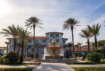 Outside view of Ponte Vedra Inn & Club and large stone waterfountain