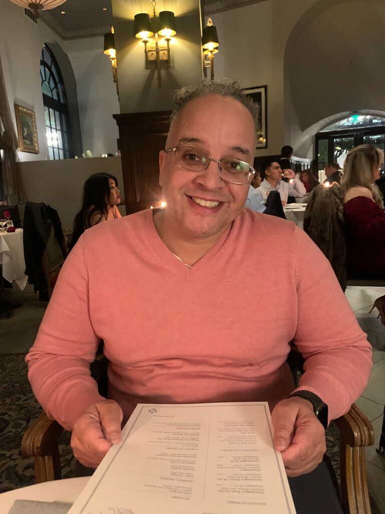 Danielle’s forever cupid is a true romantic. 💘 On their first Valentine’s Day together, Jeremy reserved a table for two at the historic Culver City Hotel in downtown Culver City, California. 🏨 After another long day of work and navigating Los Angeles traffic, 🚗 he picked Danielle up and surprised her with a gift from Venus et Fleur. 🌹 The ambiance was perfect for Valentine’s Day, setting the stage for an unforgettable evening. 🌹✨ The menu was exquisite, featuring poached shrimp cocktail, 🍤 black cod, 🐟 and a shared dessert, Chocolate Petite Plateau. 🍫 Even the butter was heart-shaped! 💖 It was the most memorable Valentine’s Day ever, filled with love, laughter, and the promise of many more to come. ❤️😊