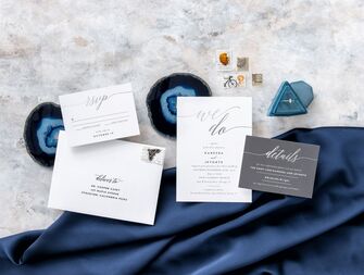 Minimalist foil wedding invitation suite ready to be mailed