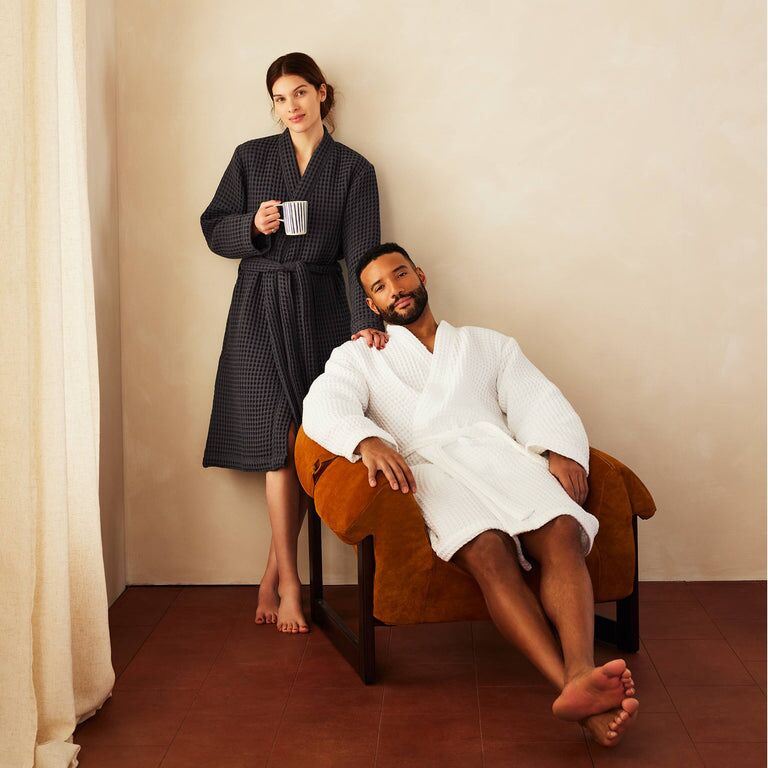 Couple wearing soft bathrobes