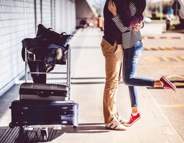 Travel hugging couple