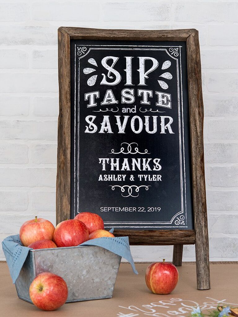 'Sip, taste and savour' in playful block type and detailed line border on chalkboard