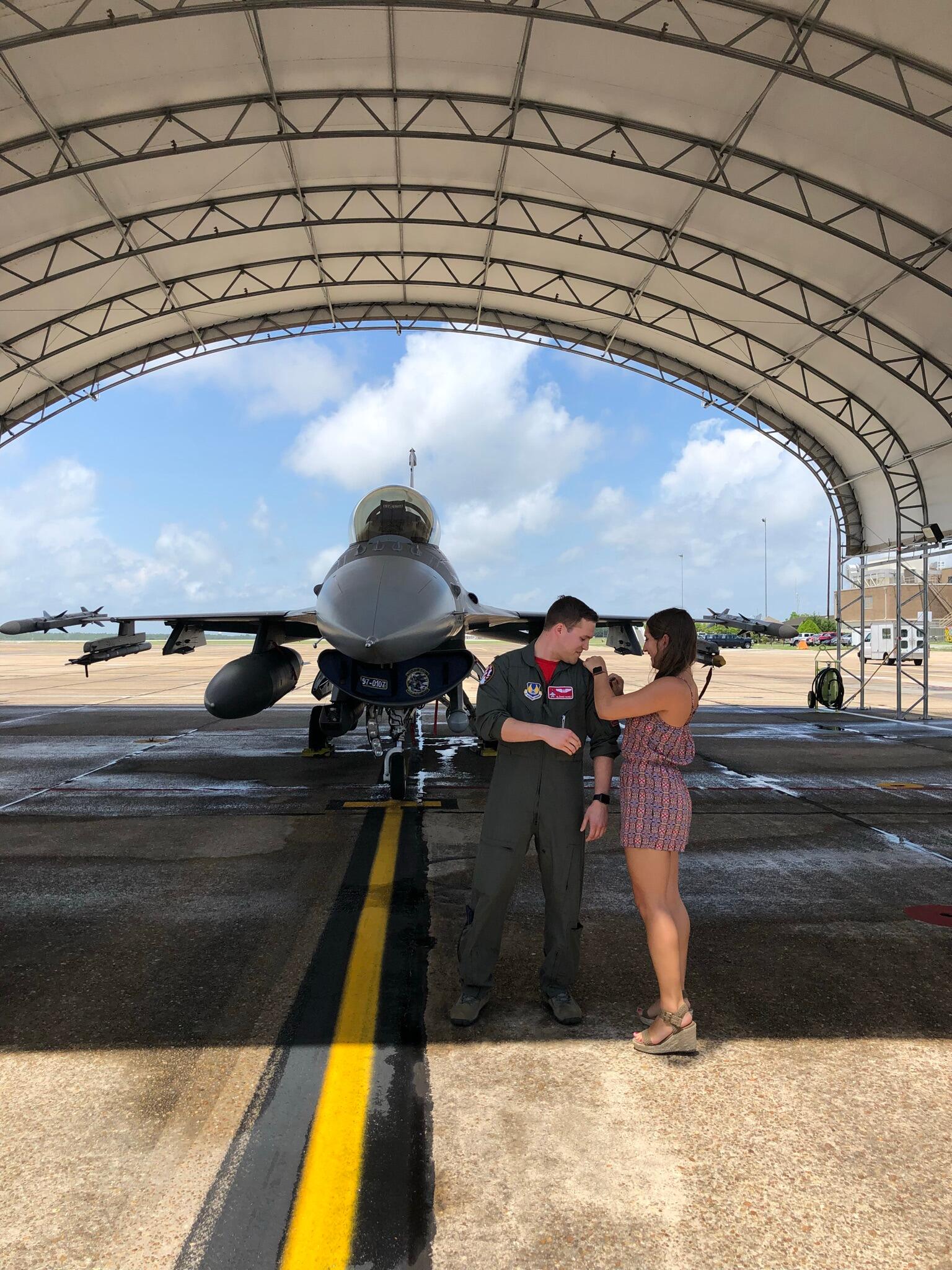 Nick's promotion to 1Lt. Marisa pinned on his new ranks.