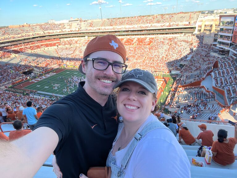 Cole finally dragged Meredith to a Texas game.
