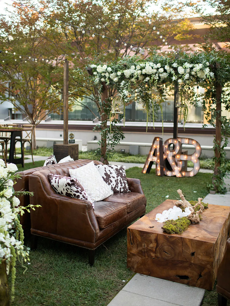 A rustic brown-toned wedding reception space