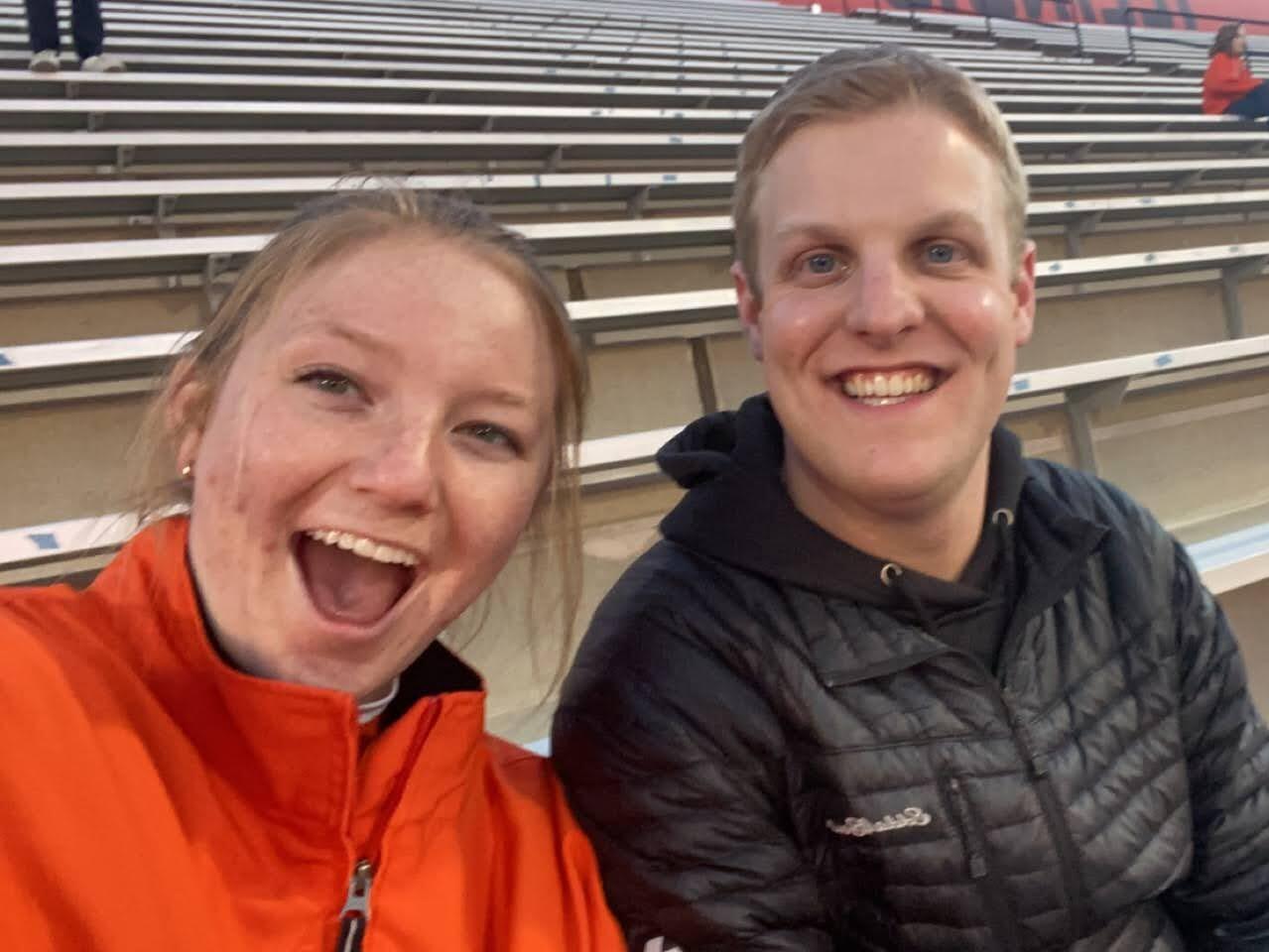 Josh and Gracie trying to beat the crowd in the student section at an Illini football game! This game was cold!!!