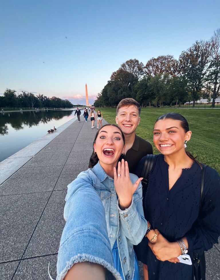 On the second night of Mark's visit, Katie thought she was getting dinner and drinks with Mark and her childhood friend, Emily, who was interning on Capitol Hill that summer. Turns out, Mark had made a plan with Emily to propose that evening!