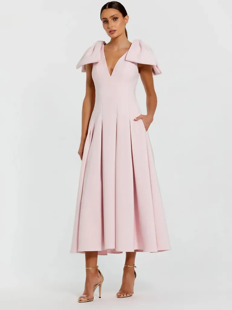 Pink crepe bow spring mother of the bride dress from Mac Duggal