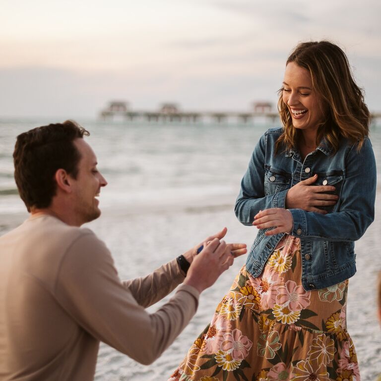 Lee thought the perfect moment would be when both of our families would be in Florida post-holidays. He had been keeping this secret for quite some time and wouldn't answer any questions when CJ asked - driving her crazy, shocker! At sunset on Clearwater Beach, surrounded by family, Lee finally dropped to a knee and asked the big question of "will you marry me?"