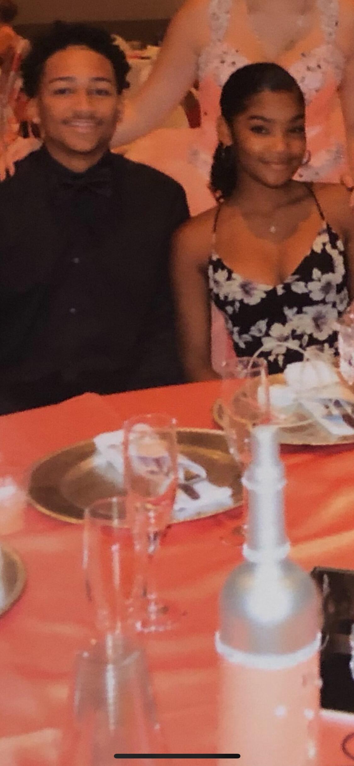 Our first picture together! Funny enough, we weren't friends at this point - just two people at the same event. We had no idea what the future had in store for us. We just so happened to take a picture together, and years later, we realized that Jadah was leaning into CJ like she had known him forever. Looking back, it's just another reminder that God was writing our story long before we knew it. 