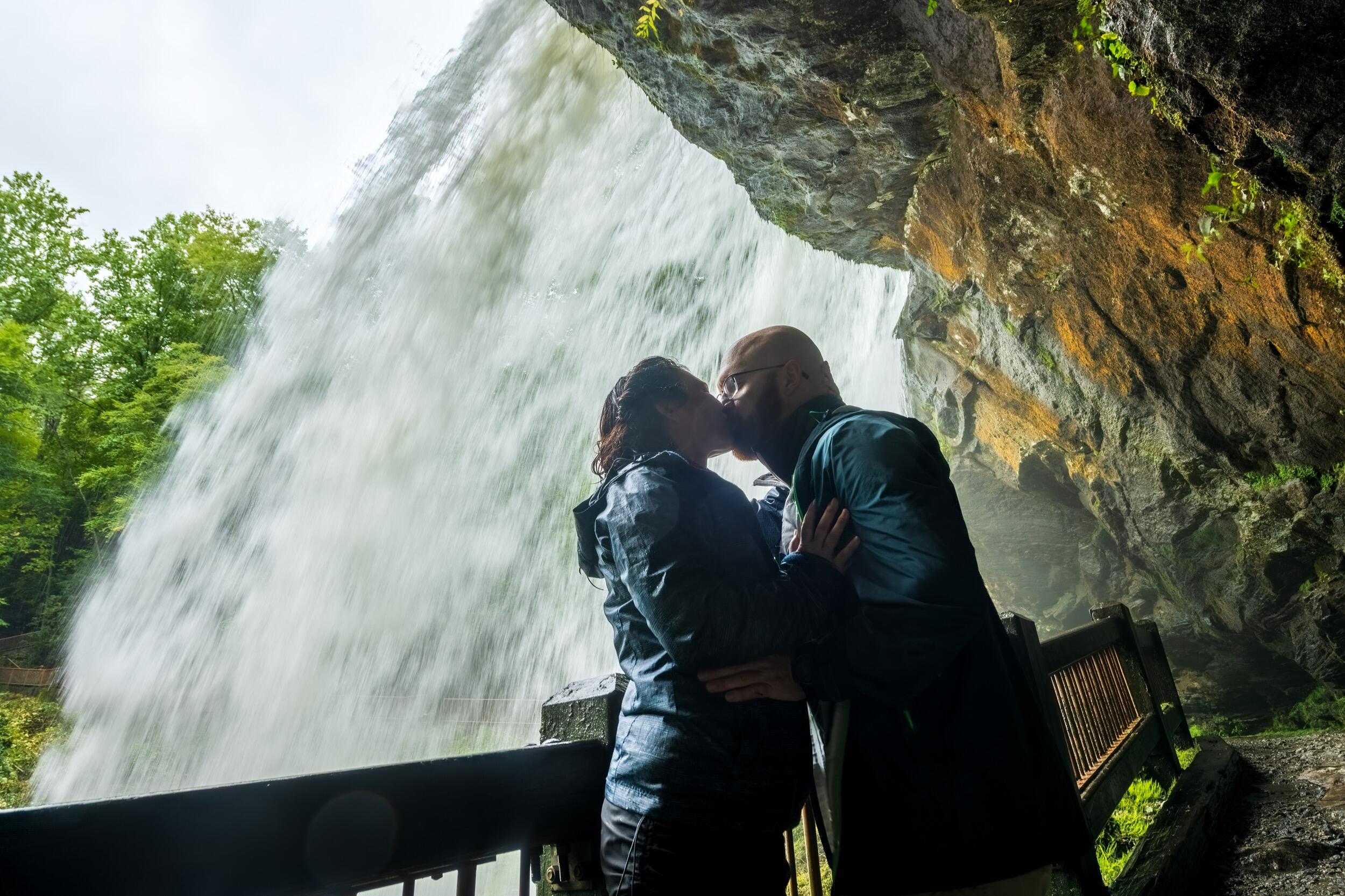 Kissing under "Dry Falls" in North Carolina