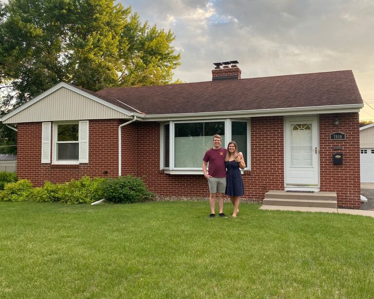 Purchased our first house together in Richfield, MN. Most important part (4 car garage) not pictured.