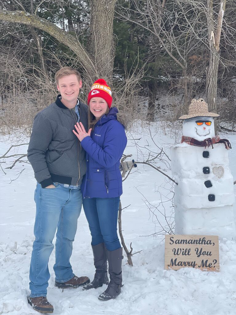And then, after coordinating all of our family and 6 hours of snowman construction, Todd popped the question! And Sam said yes!