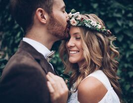 Smiling bride with groom