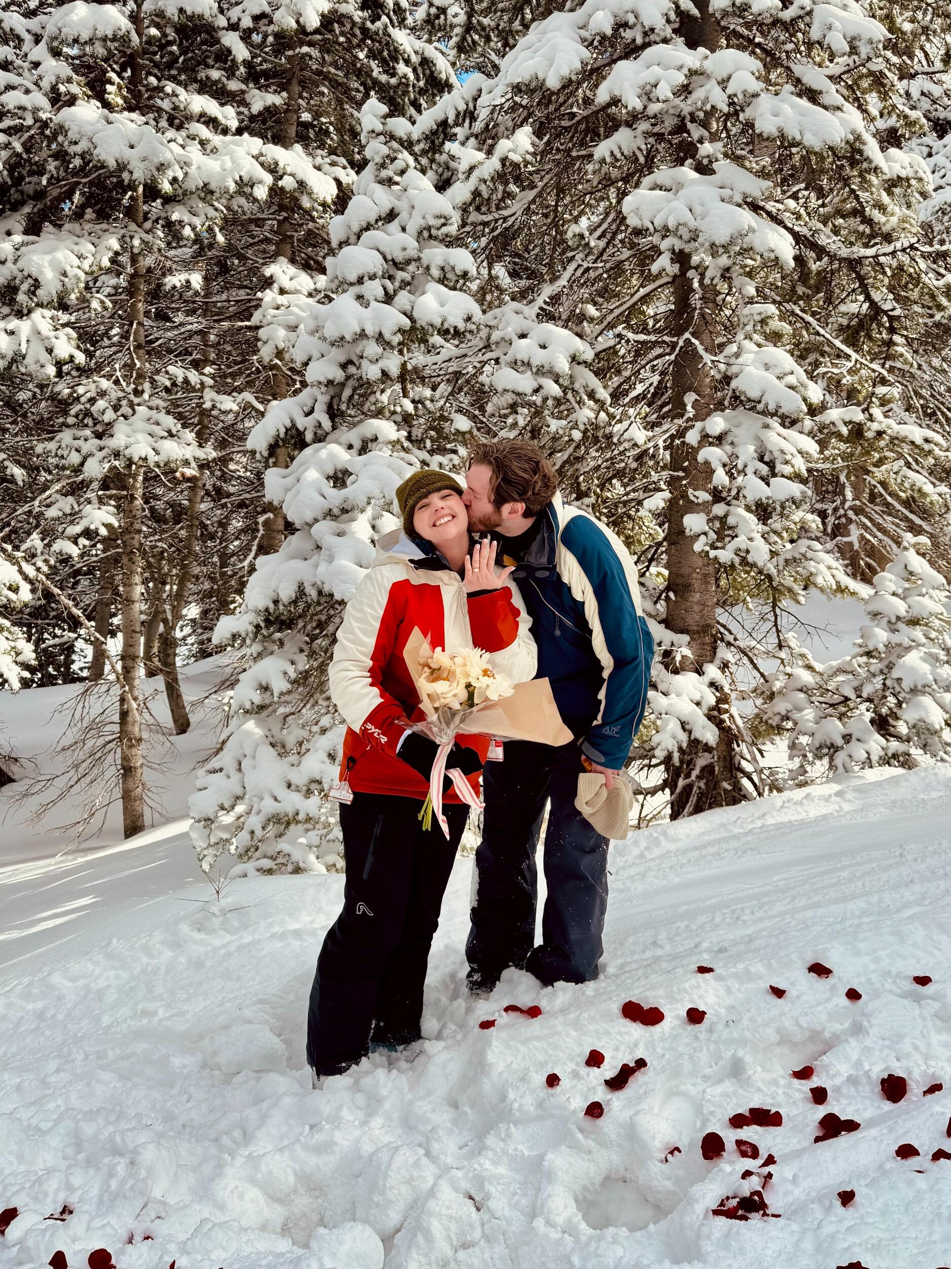 It's official! Stephen surprised Kelsey while she was skiing with her friend Tessa. 
