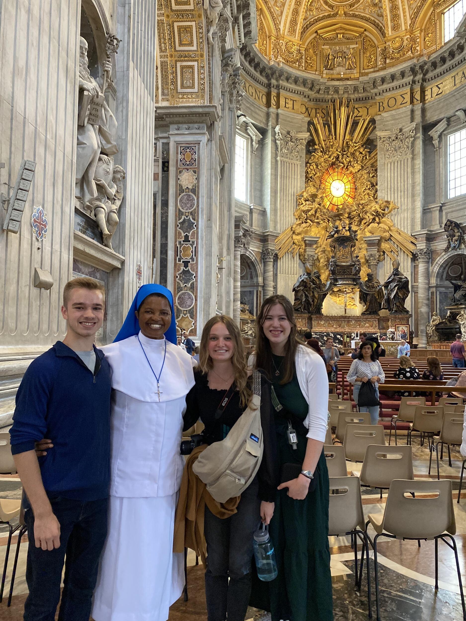 Visiting St. Peter's Basilica with friends.