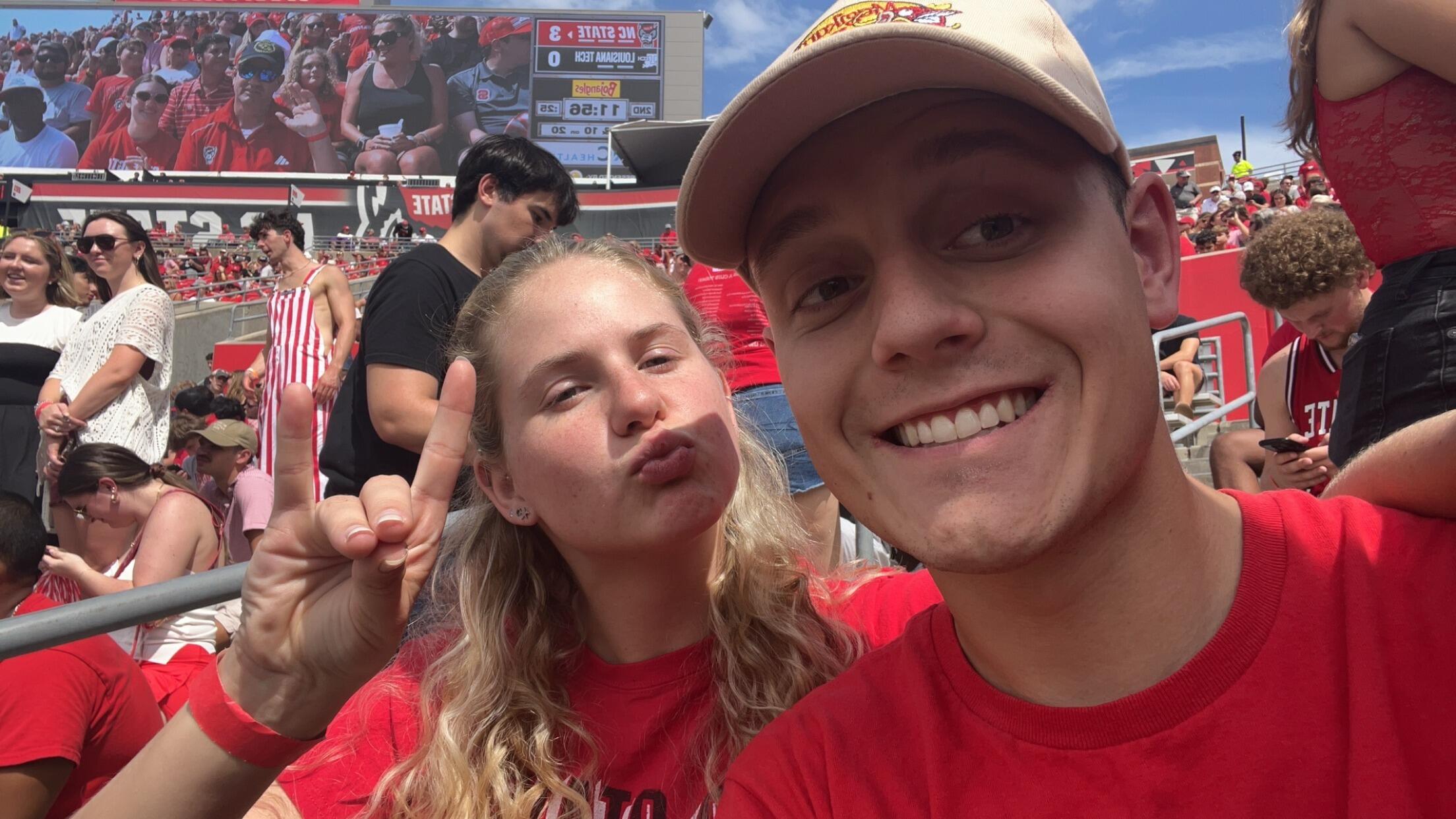 Soon after, we started our senior year together. This is a photo from our first senior football game!