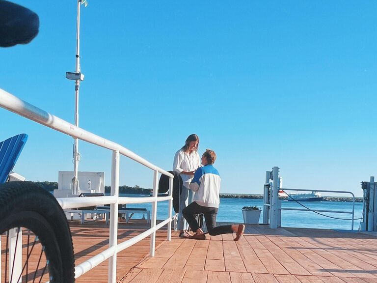 Eric proposes to Maggie on the dock where they first met on Mackinac Island 