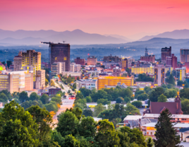 Aerial photo of downtown Asheville at sunset