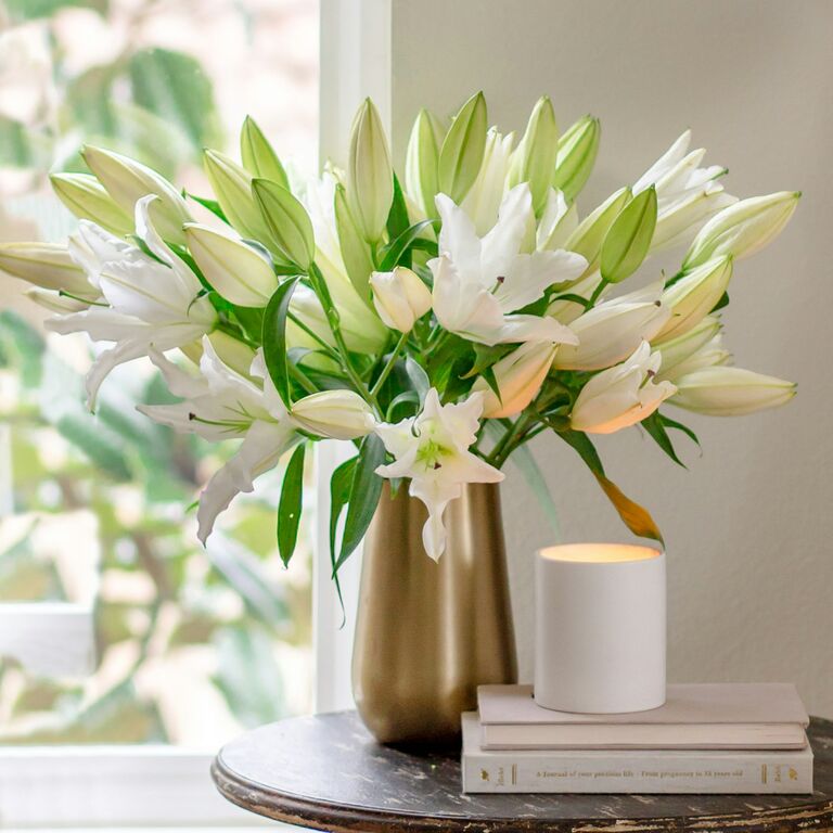 Beautiful vase with lily bouquet
