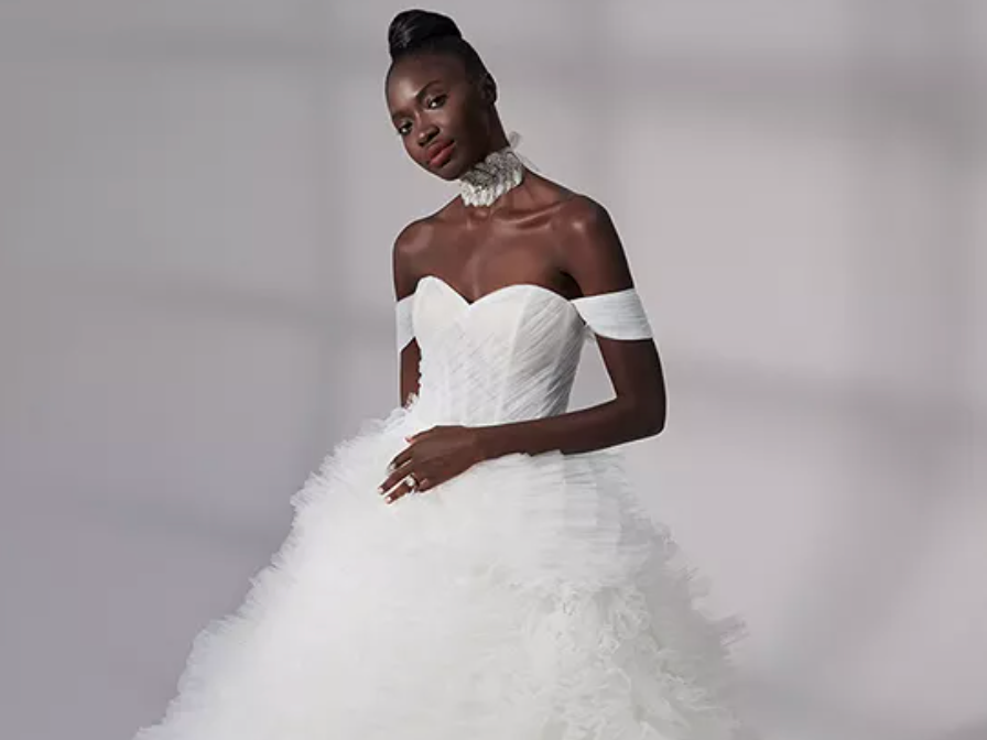 Off-the-shoulder ballgown with layers of pleated tulle skirt
