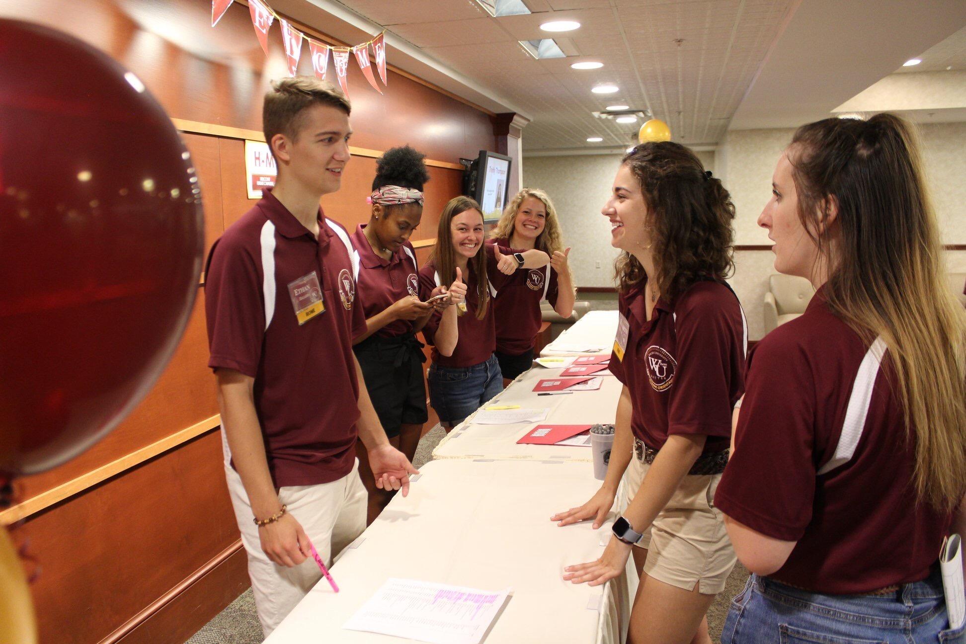 Ethan and Elizabeth met when they both volunteered to be mentors for the incoming class. This picture is from the day they met