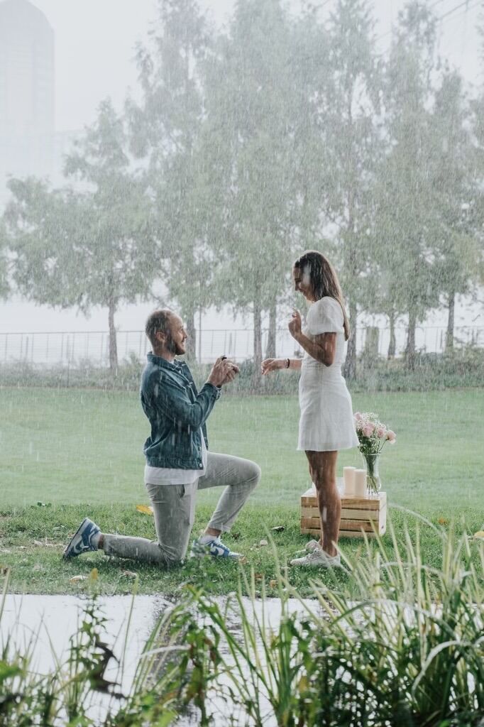Nick surprised me and made a joke back in August that we were getting engaged during Thanksgiving weekend. I was going home for what I thought was my friend's birthday weekend. My friend grace asked to take pictures by the water while it was POURING, this honestly made since for her, so I agreed. Once I saw Nick I was so surprised that I asked, "is it happening?". This was where we went on our second date, which is where I decided that I wanted to go on a third. Honestly one of our favorite dates!