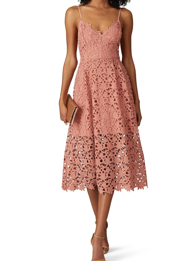 A lace a-line midi dress in the color mauve from Rent The Runway