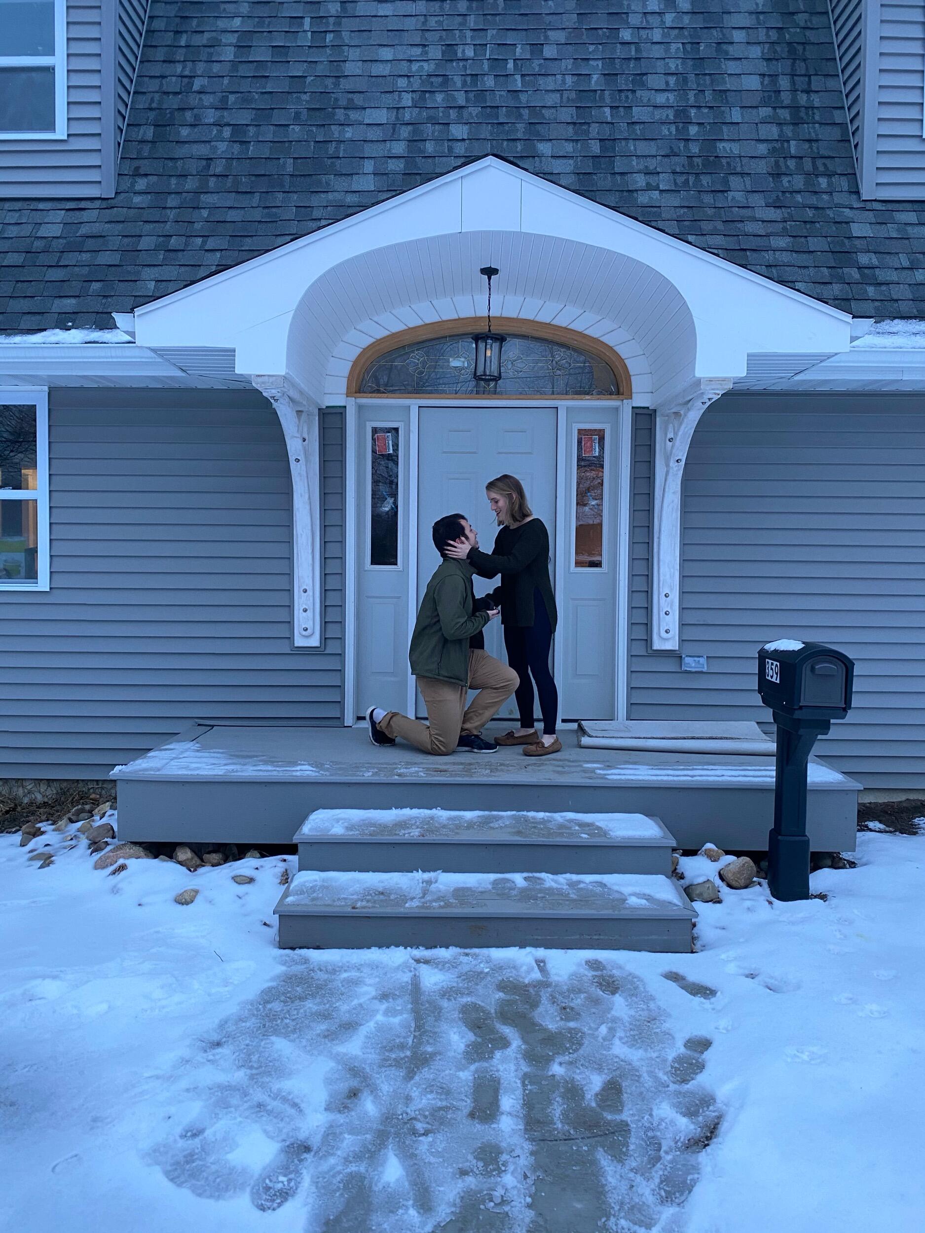 After a day of moving and packing, we take picture in front of our new home- and Nick proposed! 