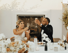 Couple toasting during wedding reception