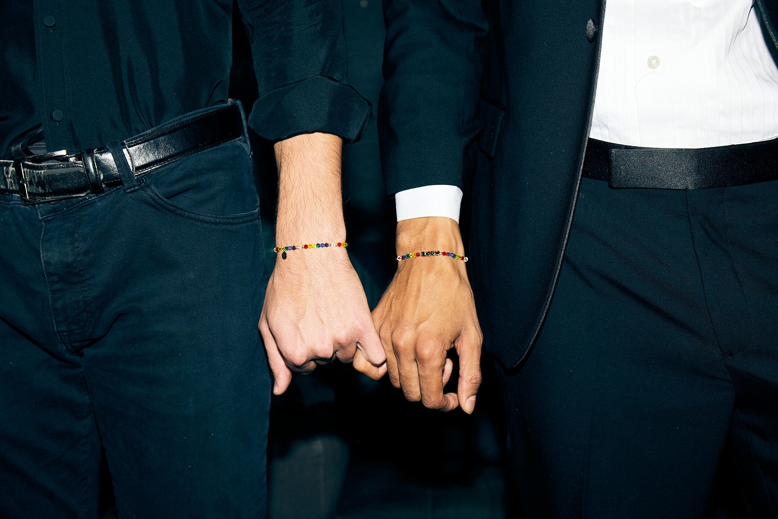 Couple Holding Hands at Wedding Ceremony