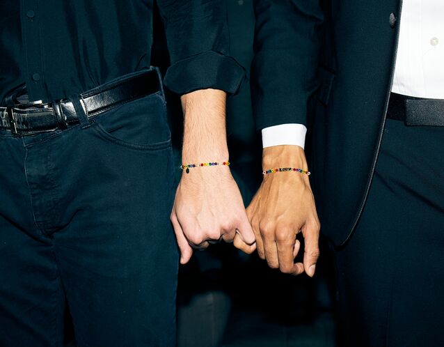 Couple Holding Hands at Wedding Ceremony