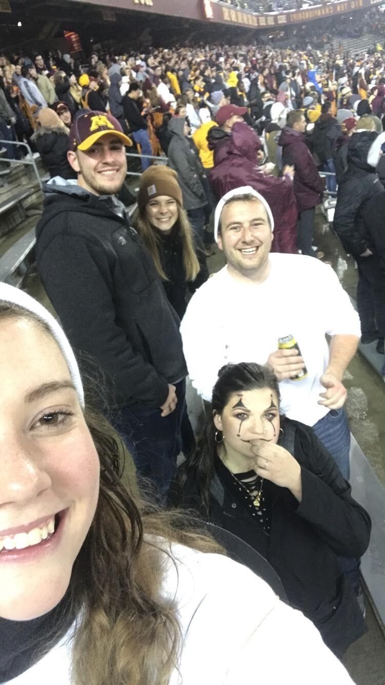 Nick and Elaina celebrate Halloween at a Minnesota Gopher's Game with Andrew and Celia who were visiting for the weekend!