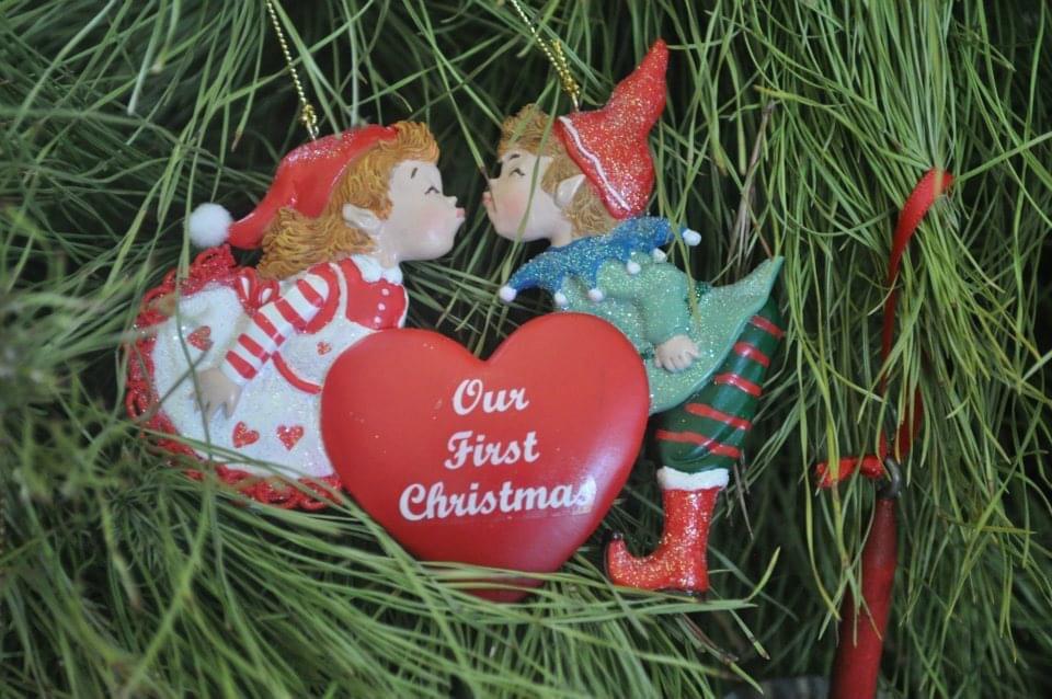 His first Christmas present to me- it still goes on our tree every year!