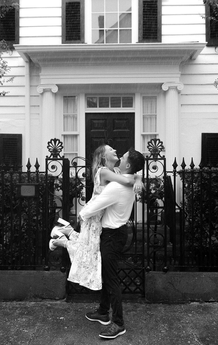 Enjoying the rain while taking our engagement photos in Charleston