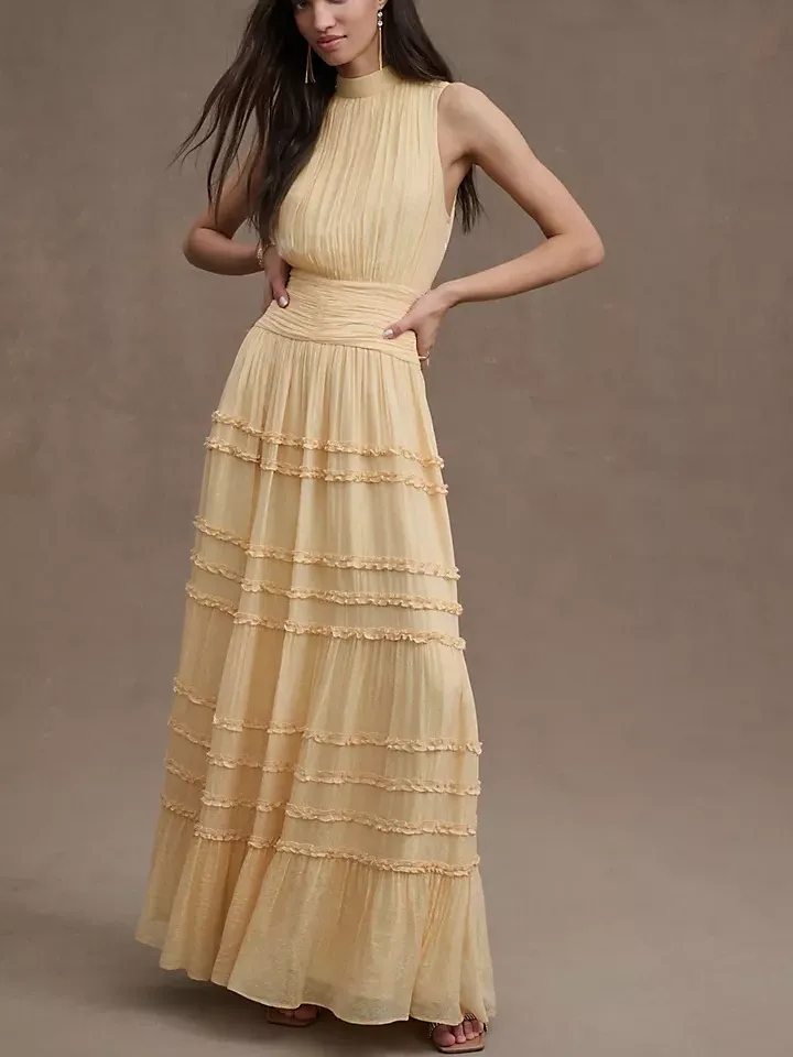 maxi pleated dress with high neck and no sleeves