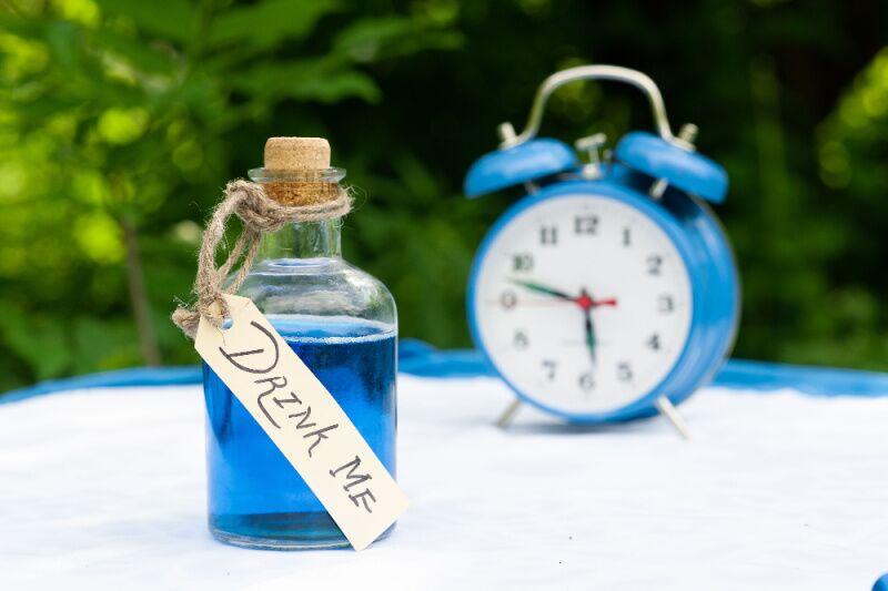 Alice in Wonderland themed party idea - drink me potion bottles