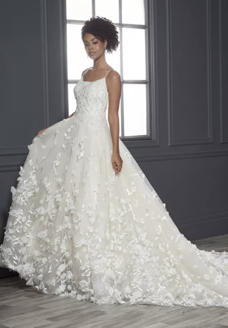 Tulle ballgown with floral embellishments and three dimensional butterflies
